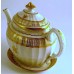 Coalport Oval Teapot and Stand, new fluted design, decorated in gilt 'garter star' with 'dot and elliptical' border pattern, c1810