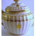Coalport Oval Teapot and Stand, new fluted design, decorated in gilt 'garter star' with 'dot and elliptical' border pattern, c1810