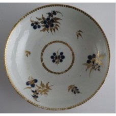 Worcester Saucer, Decorated in Underglaze Blue with Formal Flowers, Honey Gold Leaves and Stems, Gold Dentil Rim, c1785