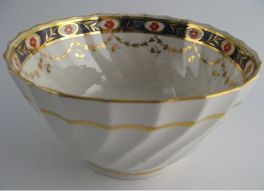 Factory 'X' (Keeling) Slops Bowl, Shanked body with blue border, red flowers and gilded swags, pattern 94, c1800-1805