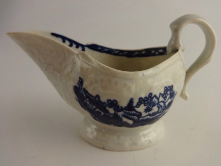 Liverpool 'Pennington?' Moulded Sauce Boat, Oriental Blue and White scenes, c1780