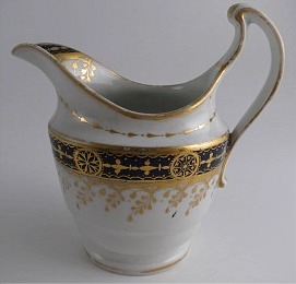 Chamberlain Worcester Oval Shaped Milk Jug, Underglaze Blue and Gilt 'Blue Border with Gold Ovals and Gilded Dropping Foliage' Decoration, Pattern Number 61, c1800-1805