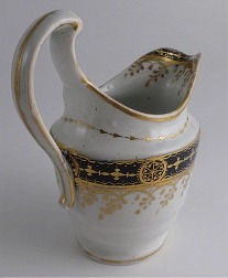 Chamberlain Worcester Oval Shaped Milk Jug, Underglaze Blue and Gilt 'Blue Border with Gold Ovals and Gilded Dropping Foliage' Decoration, Pattern Number 61, c1800-1805