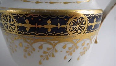 Chamberlain Worcester Oval Shaped Milk Jug, Underglaze Blue and Gilt 'Blue Border with Gold Ovals and Gilded Dropping Foliage' Decoration, Pattern Number 61, c1800-1805