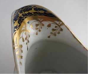 Chamberlain Worcester Oval Shaped Milk Jug, Underglaze Blue and Gilt 'Blue Border with Gold Ovals and Gilded Dropping Foliage' Decoration, Pattern Number 61, c1800-1805