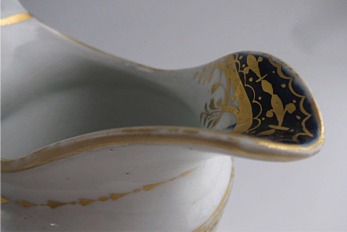 Chamberlain Worcester Oval Shaped Milk Jug, Underglaze Blue and Gilt 'Blue Border with Gold Ovals and Gilded Dropping Foliage' Decoration, Pattern Number 61, c1800-1805