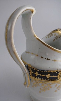 Chamberlain Worcester Oval Shaped Milk Jug, Underglaze Blue and Gilt 'Blue Border with Gold Ovals and Gilded Dropping Foliage' Decoration, Pattern Number 61, c1800-1805