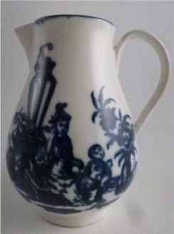 First Period Worcester Sparrow Beak Milk Jug, decorated with underglaze blue 'three flower' pattern, with a moulded lower finial, c1780