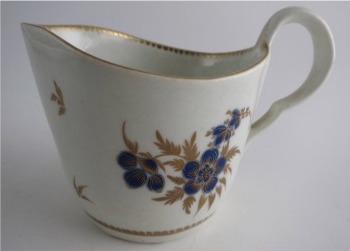 Worcester Milk Jug, Decorated in Underglaze Blue with Formal Flowers, Honey Gold Leaves and Stems, Gold Dentil Rim and Base, c1785