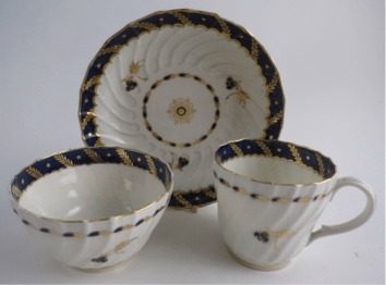 Worcester Shanked 'Trio' of Tea Bowl, Coffee Cup and Saucer, Blue and Gilt Decoration with 'Bluebell pattern', c1795