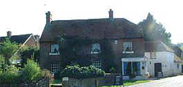 Moonlight Cottage nestling in the valley in Cocking, Southern England