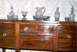 Georgian sideboard with cut glass tableware