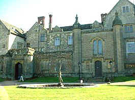 The entrance to the house is from a walled courtyard incorporating the stables and bothey on the side opposite to the house.