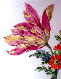 A close up of the tulip on the dessert dish, made by 'Marcolini' Meissen has a bouquet.