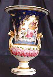 A further example of fashionable tulips are displayed on this Coalport Vase.